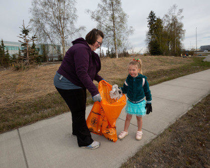 Staff Helping with Curbside Cleanup